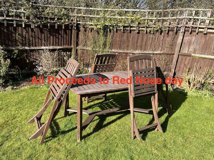 FreelyWheely Hard Wood Garden Table and 4 folding Chairs.