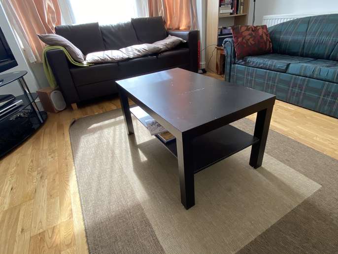FreelyWheely Brown wooden living room table