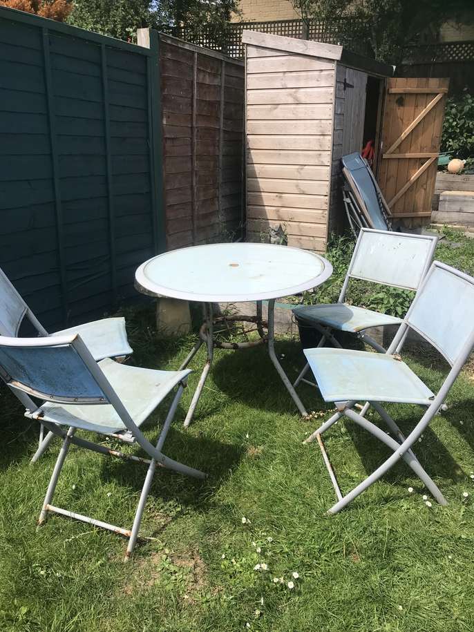 FreelyWheely: Garden furniture - Glass top table and 4 chairs