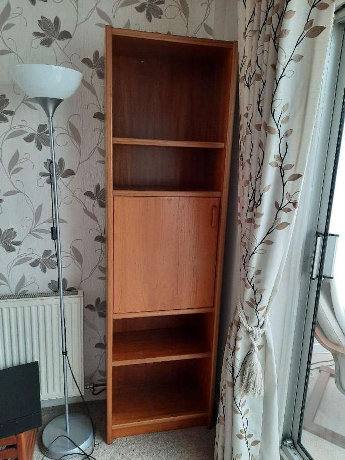 FreelyWheely Bookcase with cupboard below.
