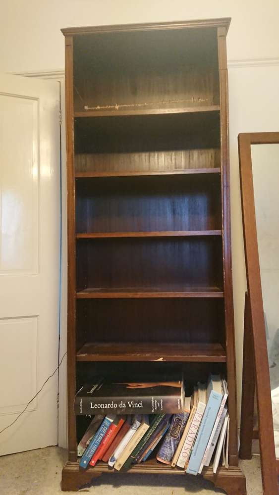 FreelyWheely Dark wood tall bookcase