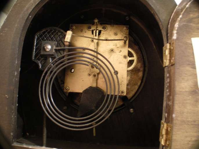 FreelyWheely: Mantle piece Grand mother chiming clock.