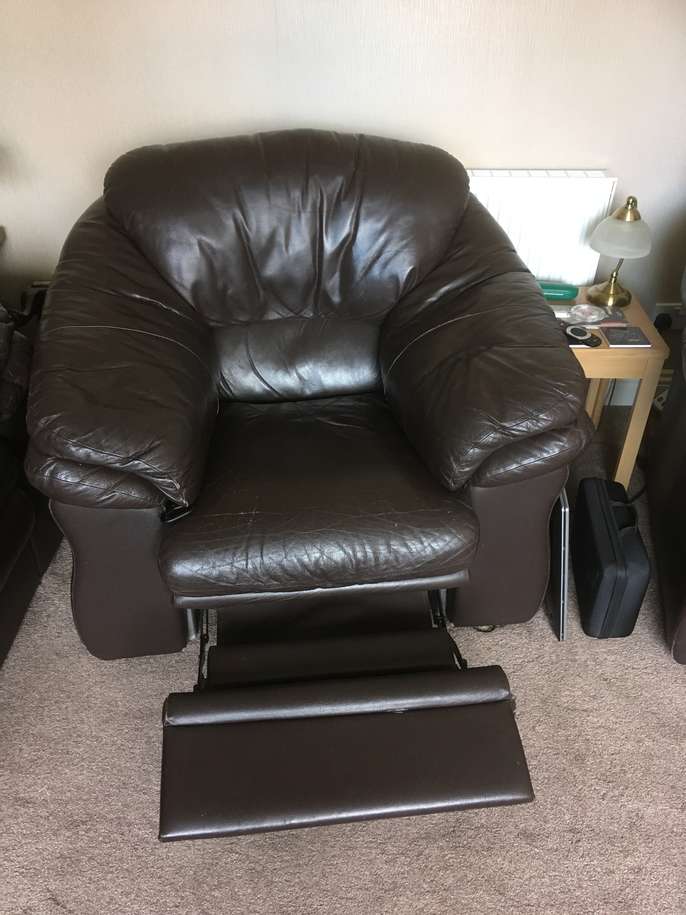 FreelyWheely Two brown recliner chairs