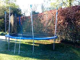 Freecycle 14ft trampoline with safety net and cover