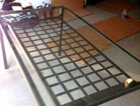 Freecycle Table with Glass top-good condition-metal frame