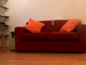 Freecycle Dark red two seater sofa