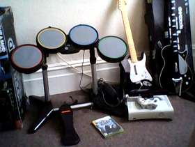 Freecycle Xbox 360, kinnect, drum kit guitar, beatles guitar +7 games