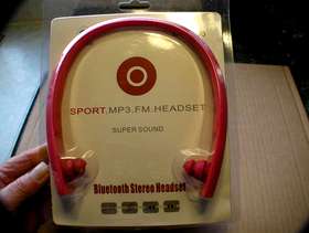 Freecycle Red Bluetooth Stereo Sports headphones.
