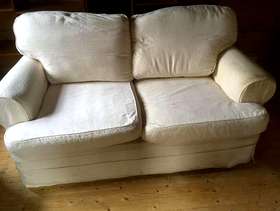 Freecycle 2 seater cream sofa.