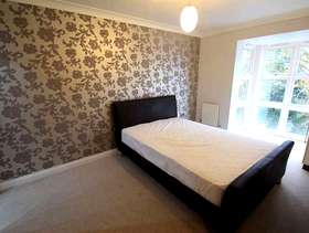 Freecycle Dark brown faux leather double bed frame