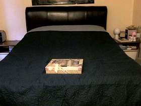 Freecycle King size divan bed with black leather headboard