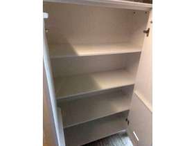 Freecycle Tall white wooden cupboard, used as small bedroom storage cupboard