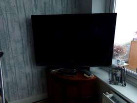 Freecycle Big flat screen t v , with small t v ...