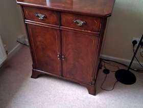 Freecycle Mahogany finish repro cupboard.