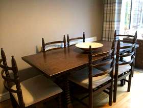 Freecycle Chestnut wood Toledo suite dining room set by Younger