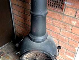 Freecycle Cuba cast iron chimenea with brand new waterproof cover