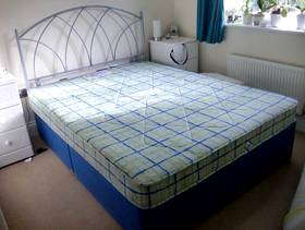 Freecycle King size bed with metal headboard