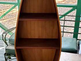 Freecycle Canoe shaped bookcase/ storage