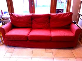 Freecycle 3 seater red IKEA sofa