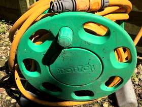 Freecycle Long length of garden hose on reel