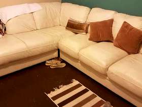 Freecycle Cream leather sofa