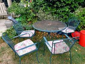 Freecycle Garden table, 4 chairs and cushion seat pads.
