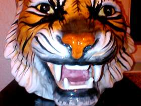 Freecycle Large ceramic Tiger head plant holder.