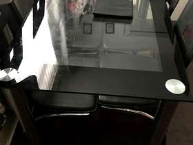 Freecycle Black and clear glass table and chairs