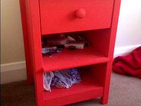 Freecycle Red beside table with drawer