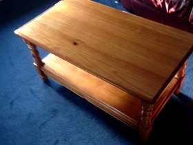 Freecycle One red cloth armchair and a coffee table