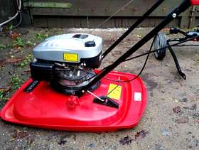 Freecycle Cobra four stroke hover mower with transport wheel set