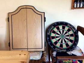 Freecycle Dartboard with wall mounted cabinet and darts