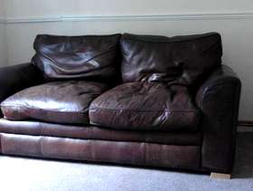 Freecycle Brown leather large two seater sofa.