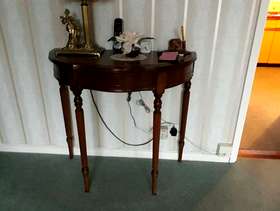 Freecycle Semi circular side table with leather (Faux?) inset.