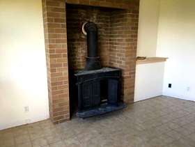 Freecycle Cast iron wood burning stove.