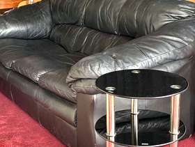 Freecycle Black 3 seater soft leather sofa and 3 tier black ...