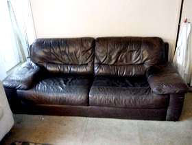 Freecycle Large two seater brown leather sofa