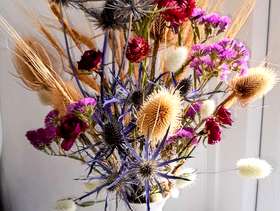 Freecycle Dried flowers in a pretty china vase