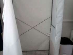 Freecycle Covered clothes rail - temporary wardrobe