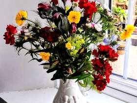 Freecycle Fresh flowers in a pretty china jug