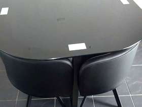 Freecycle Brand new black glossy glass table & 4 chairs