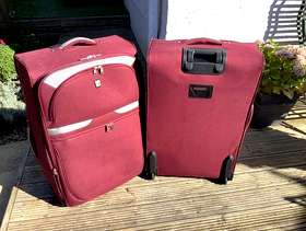 Freecycle Two large lightweight suitcases.