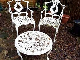 Freecycle White metal low level table and two chairs.