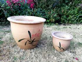 Freecycle 2x matching flower/leaf decorated plant pots