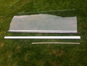 Freecycle Curved bath, glass shower door