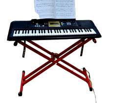 Freecycle Yamaha YPT220 Portable Keyboard with adjustable stand in excellent condition