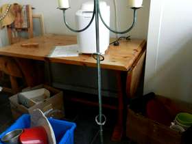 Freecycle Tall metal free standing candle stick.