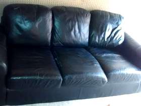 Freecycle Black leather comfy sofa.