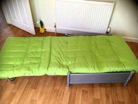 Freecycle Green single bed folding up to a chair