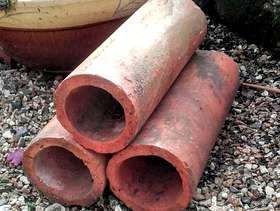 Freecycle Vintage terracotta land drain pipes, planters design feature